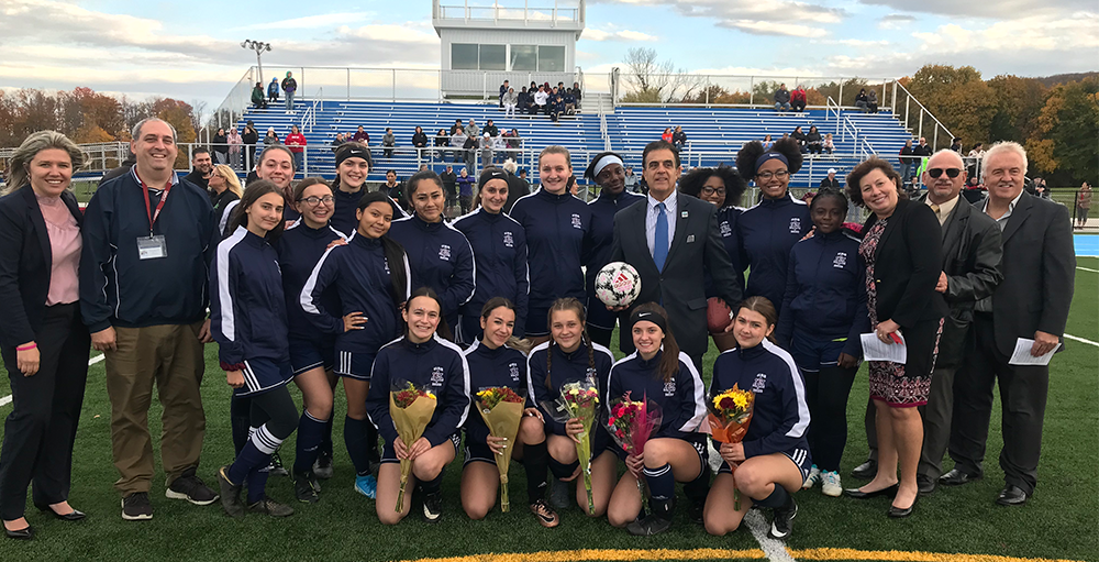 Community members and leaders held a ribbon cutting ceremony to commemorate the opening of a new soccer field. Atoms took on Notre Dame and came away with the victory