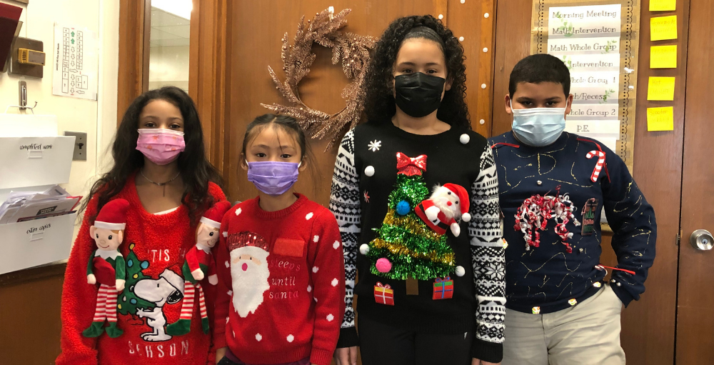 Utica Academy of Science elementary school students, teachers, faculty and staff wear their favorite festive holiday or ‘ugly’ sweater.