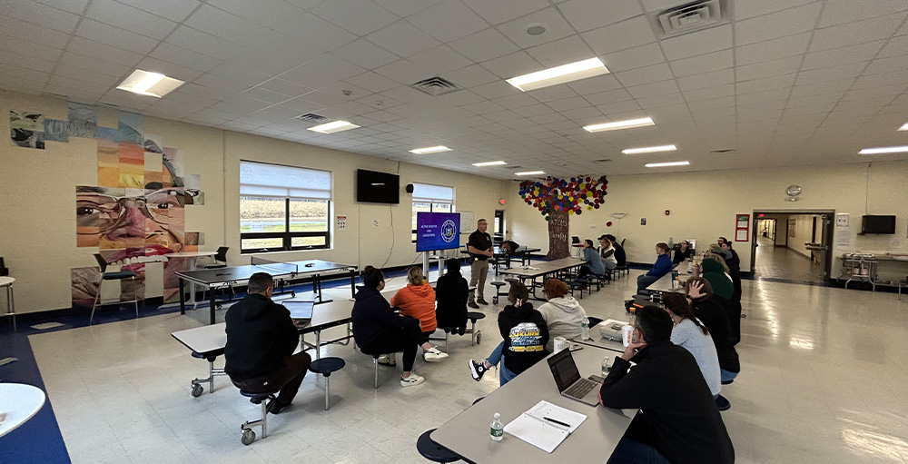 State Trooper Gives Utica Academy of Science Staff Active Shooter Training