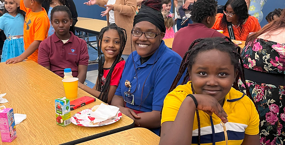 Utica Academy of Science Atoms Invite Women in their Life to the School for "Muffins with Marvelous Women"